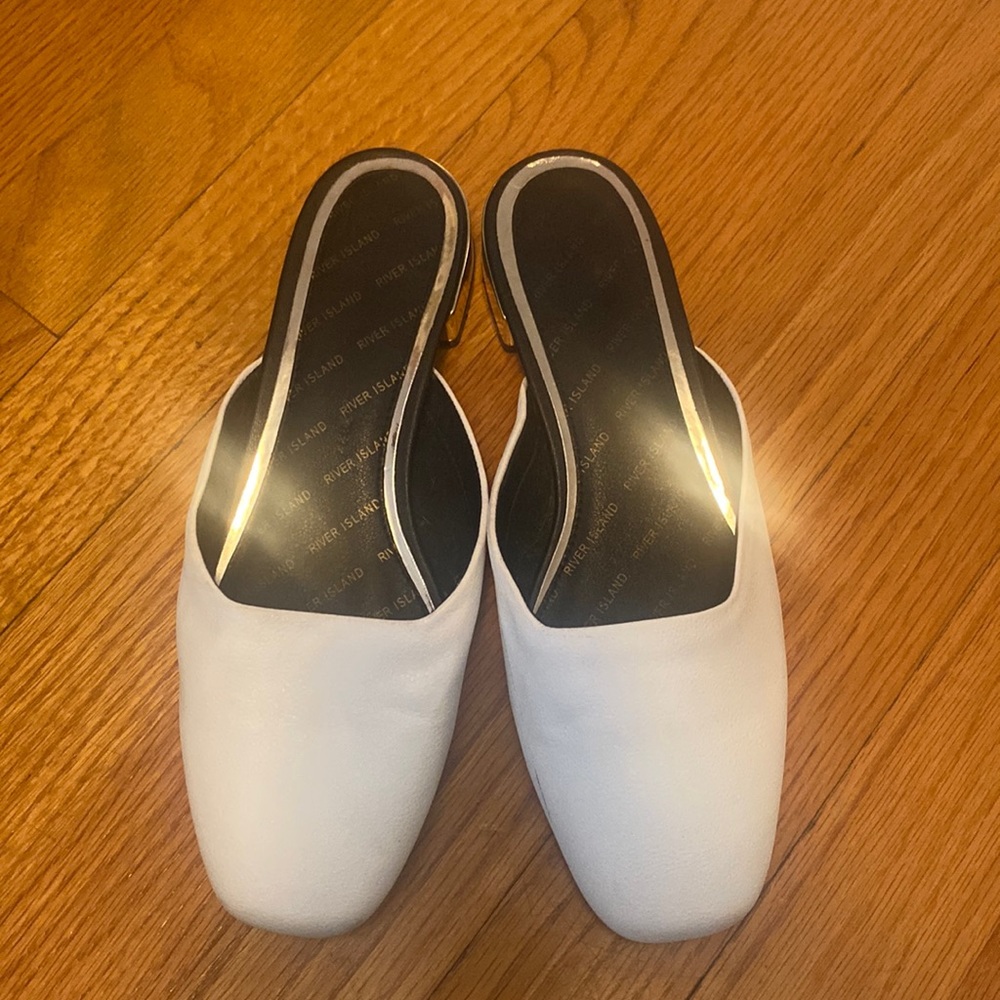 Lightly worn white slides